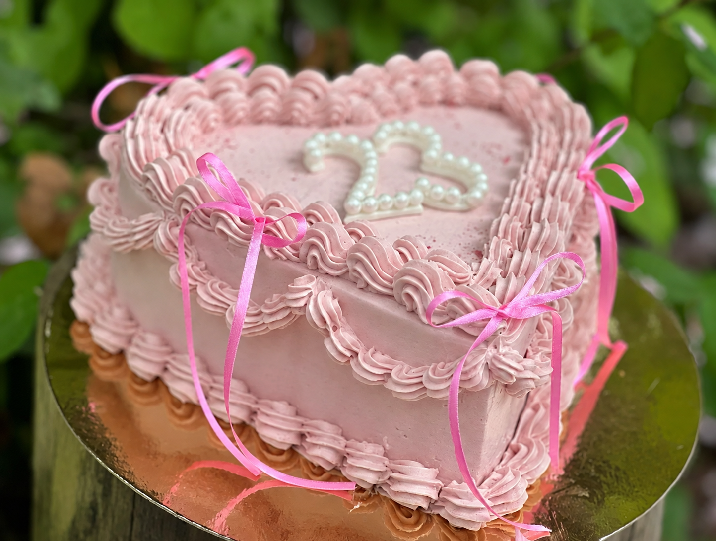 Herztorte mit rosa Buttercreme